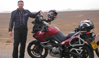 .Slaithwaite businessman Paul Mulcock survives Sahara heat and scorpion bite on desert bike trek.